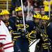 The Michigan team celebrates a score in the second period of the game against Miami on Saturday, March 23. Daniel Brenner I AnnArbor.com